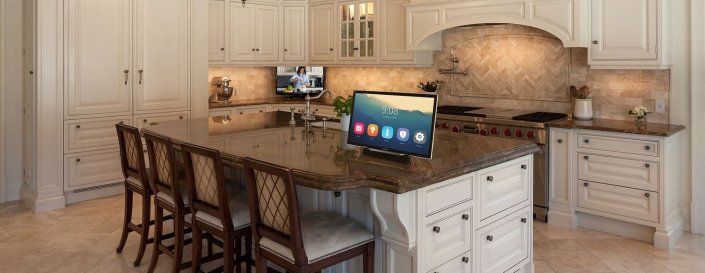 cuisine avec îlot central dans une maison équipée en domotique